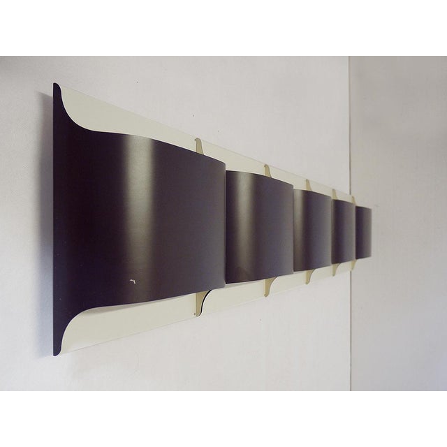 A set of five metal wall panels by staff, germany, designed by r. Krueger & d. Witte in 1968. Each lamp takes one large...