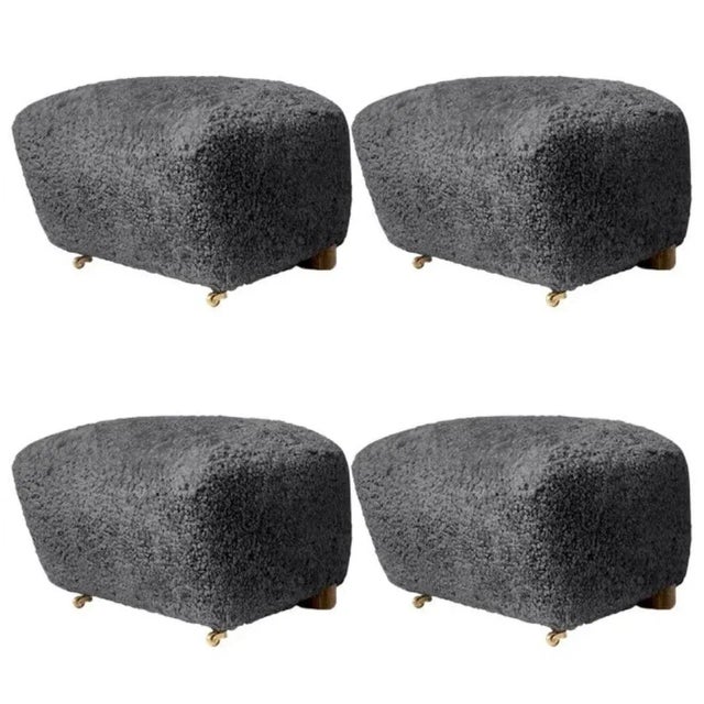 Set of 4 antrachite natural oak sheepskin the tired man footstools by Lassen. Dimensions: W 55 x D 53 x H 36 cm Materials:...