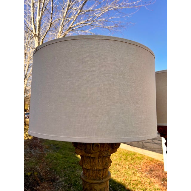 Pair of rare Restoration Hardware lamps including drum shades. Lamps are hand-turned and hand-carved fluted base and...