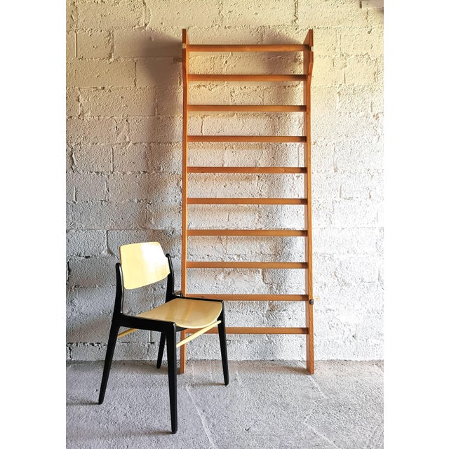 This high-quality wall bar, made of solid pine, was manufactured by UNILIFE in the 1960s as professional equipment for...