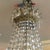 Very attractive and impressive multi level full crystal chandelier on brass frame. The crystals drape and dangle in...