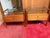These 1960s Parallel by Drexel walnut side tables have glass tops and two drawers. The original glass tops highlight the...