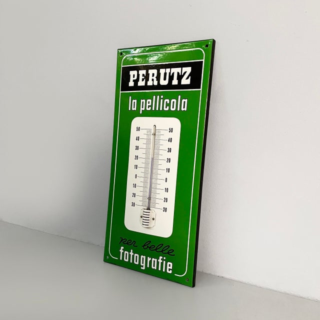 Italian mid-century modern wall thermometer Perutz in metal, 1950s Green metal wall thermometer. White lettering on the...