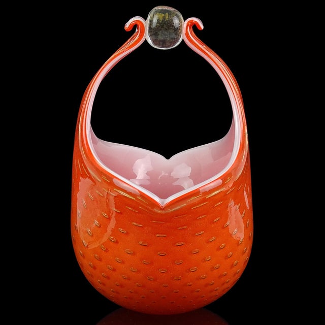 Beautiful vintage Murano hand blown orange, controlled bubbles and gold flecks Italian art glass flower basket / vase. The...