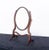 Sheraton style mahogany oval toilet mirror Circa 1900 This mirror stands upon shaped feet with shaped supports and a...