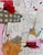 Soft pinks and ochres combine with a polka-dotted brown shape, flashes of scarlet, looping pencil lines and fragments of...