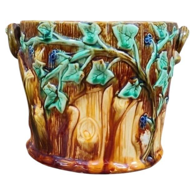 Majolica cache pot with leaves & branches, circa 1890.
