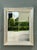 This vintage carved wood wall mirror offers a timeless balance of classic craftsmanship and understated elegance. Framed...