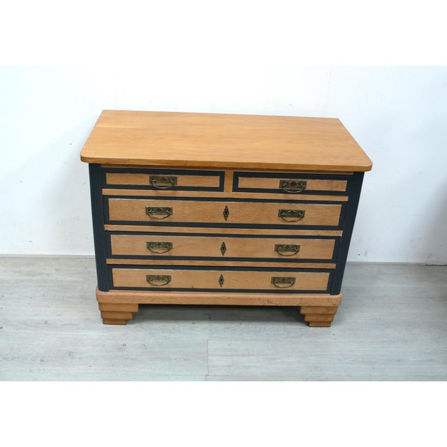 Beautiful art deco chest of drawers in natural oak with dark gray accents, from the 1920s with 3 large and 2 small...