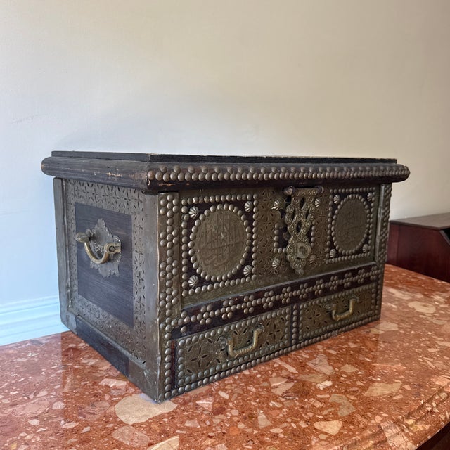 This 19th century hardwood Zanzibar chest was purchased in England. It has a lovely color and good antique patination with...