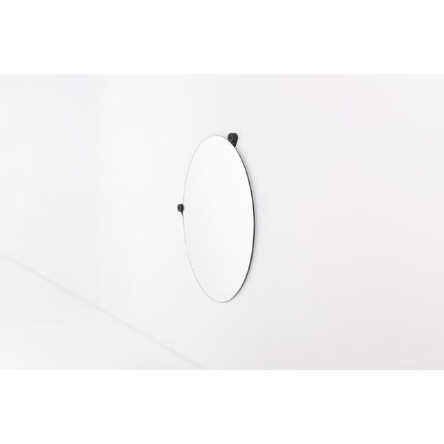 Oval mirror 'Venezia 85' designed by Nanda Vigo and produced by Morphos (Acerbis International). Label marked Condition...