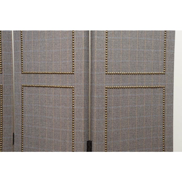 If you are looking for a distinctive room divider, this four-panel folding screen might fit the bill. Custom made and...