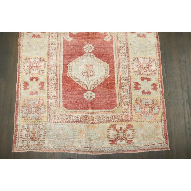 One of a kind Turkish Prayer Niche Anatolian Oushak Rug from the early 20th century.