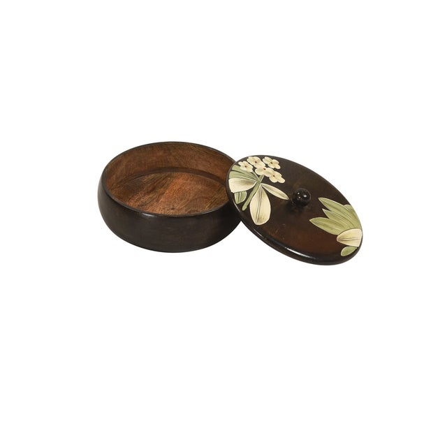 Bring the vibrant soul of traditional artistry into your home with this exquisite Hand Painted Round Wooden Box with Lid....
