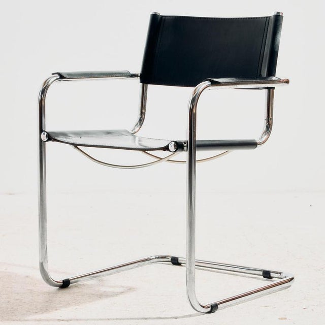 An Austrian Blaha armchair from the 1970s with a Bauhaus-style chrome tubular frame. with some scratches, wear and rust on...