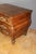 A Bordeaux-style walnut commode, curved and molded on three sides, with three drawers, solid walnut top, waxed finish,...