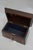 Attractive rosewood jewellery box with decorative scroll inlays, lined interior and original working lock with a key. This...