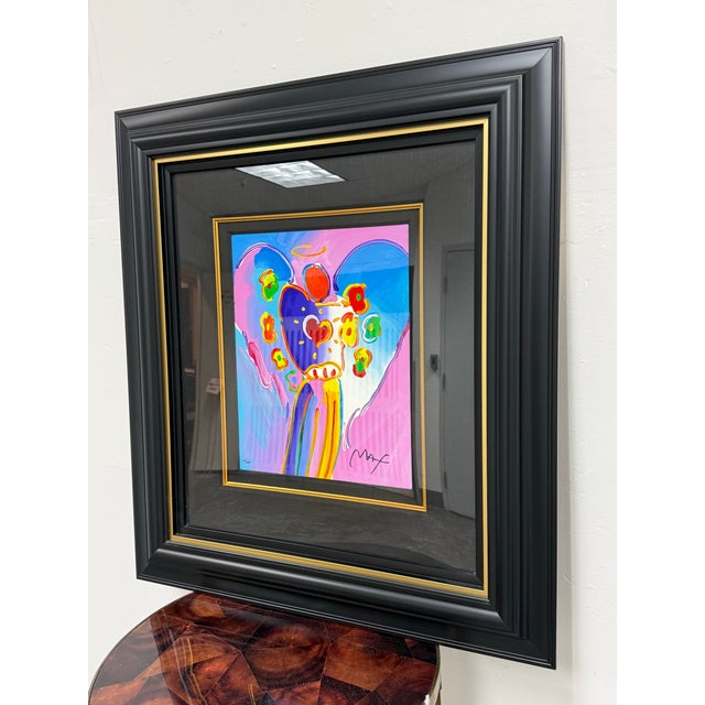 Design Plus Gallery presents Angel with Heart by Peter Max. The artist paints his angel with a spirited color palette, in...