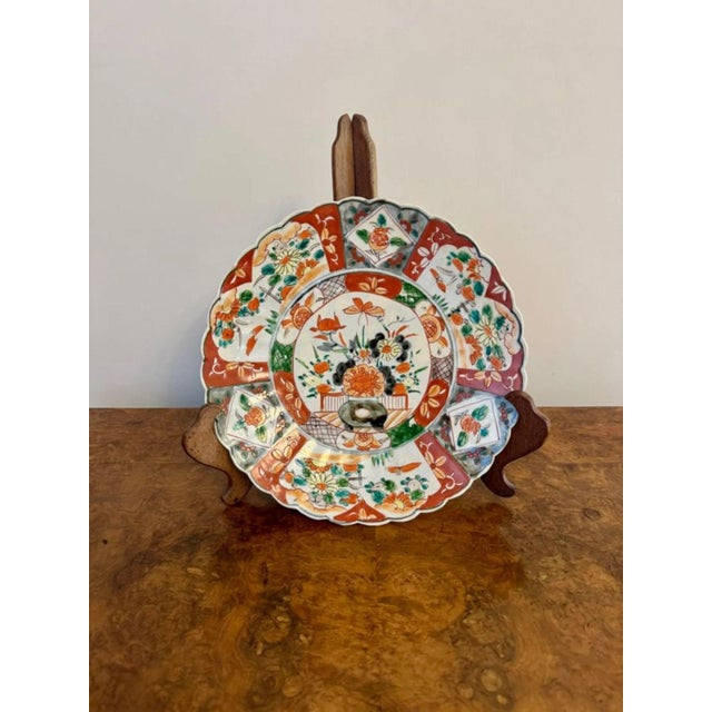 Lovely quality antique Japanese imari plate, having a quality antique Japanese imari plate decorated with a basket of...