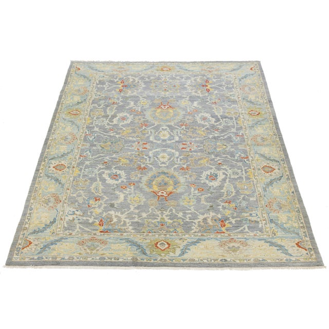 Elevate your living space with this exquisite Modern Sultanabad wool rug. Combining centuries-old design heritage with a...