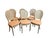 An elegant yet fun set of six vintage French Louis XVI style dining chairs dating to the 1970s, featuring classic oval...