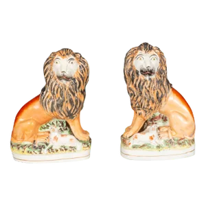 Matched Staffordshire Pottery Lions - a Pair