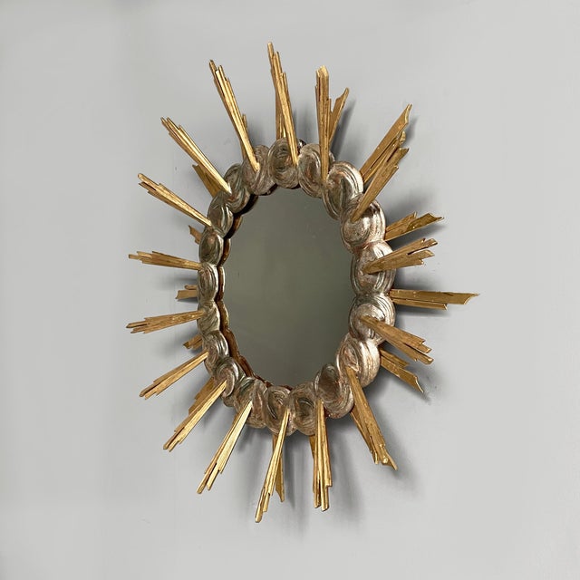 Italian mid-century modern round wall mirror in wood, 1950s Round wall mirror with finely crafted wooden frame with silver...