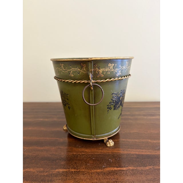 A gorgeous neoclassical green & gold tole cachepot, planter, or vase with head-painted details and brass lion heads Italy,...