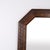 Rectangular mirror with a carved dark oak frame dating from the 1940s. It features classic decorative details and is...