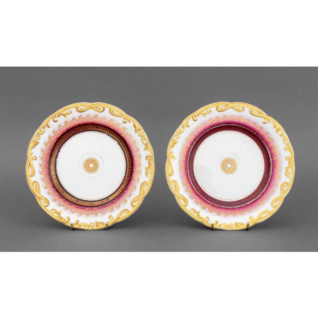 Set of Six Limoges Porcelain Plates, with gilt and red painted geometric and foliate design, impressed "A" to underside....