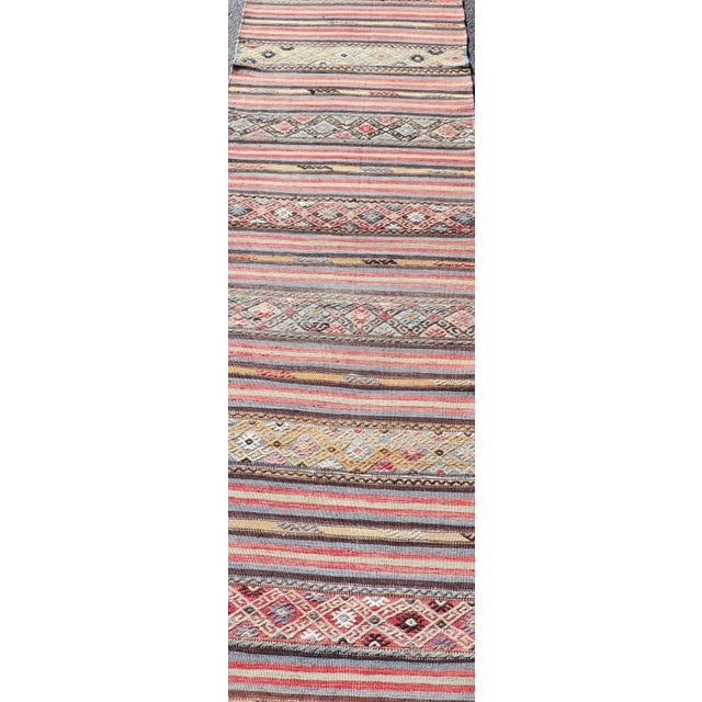 Mid 20th Century Mid 20th Century Vintage Turkish Kilim With Horizontal Stripes and Tribal Motifs in Bright Tones For Sale - Image 5 of 12