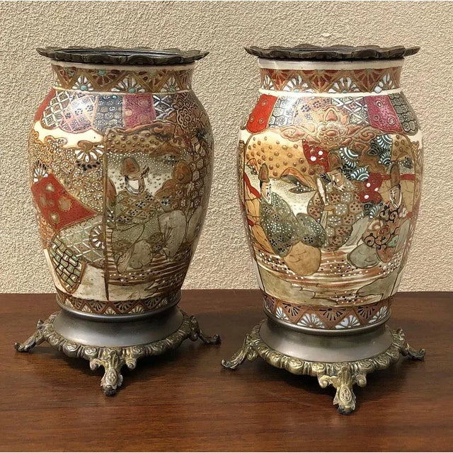 Pair 19th Century Oriental Satsuma Vases were hand-painted on the finest Japanese porcelain then set on cast bronze bases...