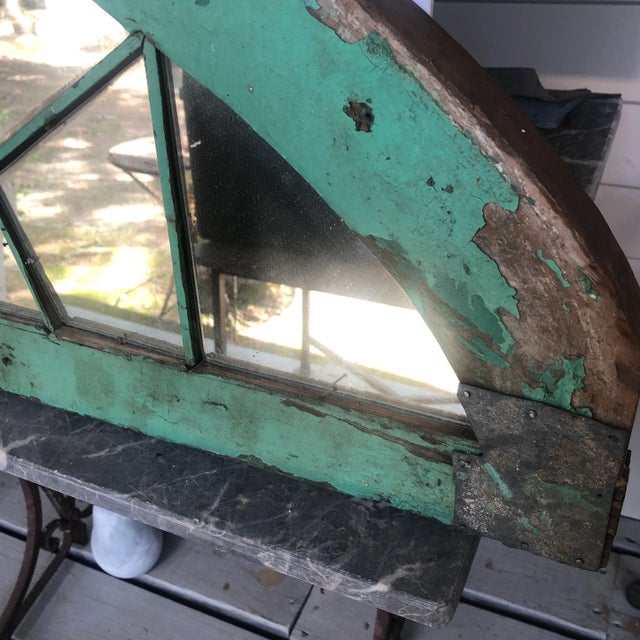 Green paint antique arched window with mirrored glass Naively repaired with old glue remnants visible, sturdy