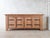 Mid 20th Century Spanish Oak credenza from the 1940s. Stunning solid oak sideboard with typical arched doors and large...