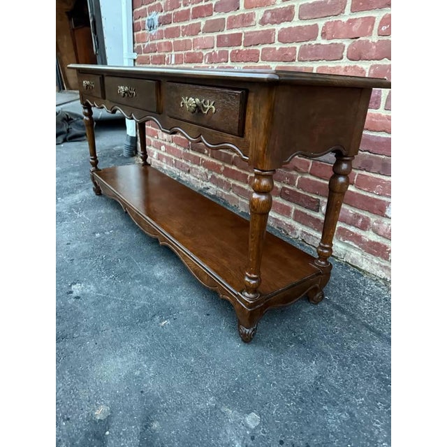 Vintage French Country Style Oak 2 Tier Sofa Console Table by Hickory Brass hardware, dovetail joint construction,...
