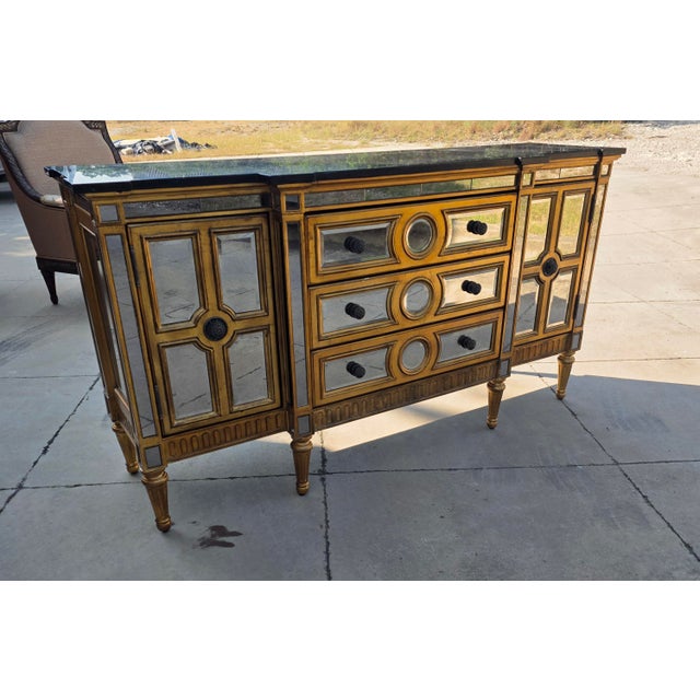 Great looking Sideboard with drawers and door compartments at each end. This is newer and made in the style of a French or...
