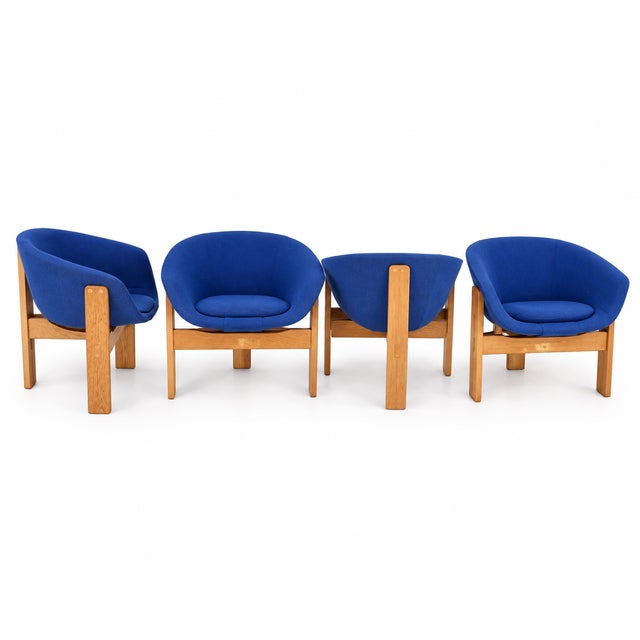 Set of Four Scandinavian Modern–Style Tub Chairs with Oak Tripod Bases Distinctive set of four tub chairs pairing...