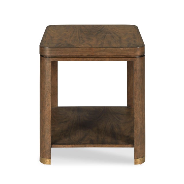 A rectangular top is elevated on squared corner posts that are joined by a low shelf. Materials: Hardwood solids, Walnut...