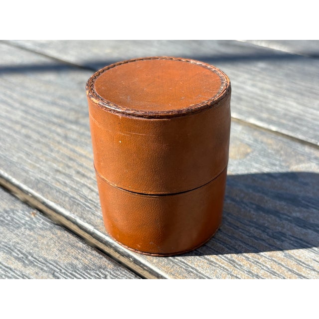 Early 20th C. Campaign-Era Travel Cups in a Leather case - a pair. Case stands just 2.5" tall, with a 2.25" diameter....