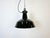 Industrial black enamel pendant light made by Elektrosvit in former Czechoslovakia during the 1950s. White enamel inside...