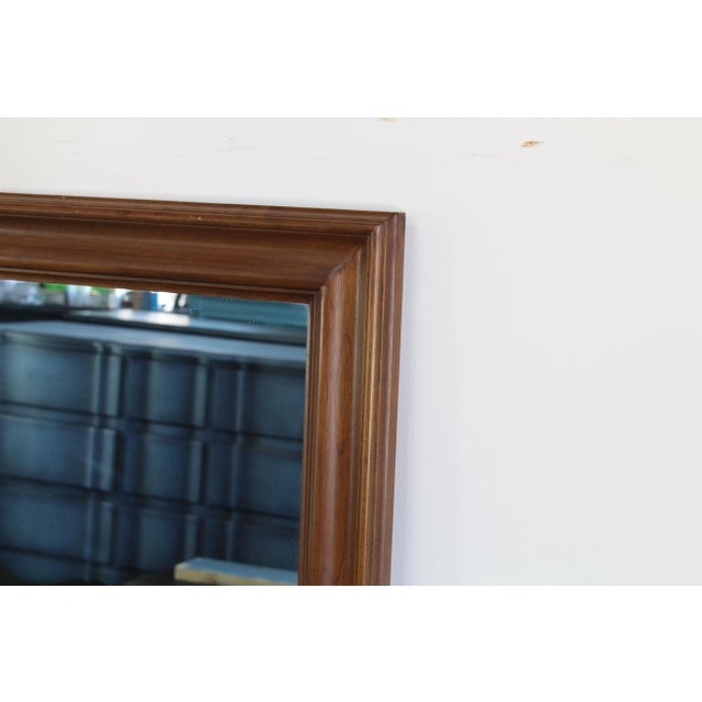 Mid century walnut mirror This mirror is in great vintage condition Dimensions; 36" Width x 1" Depth x 48" Height See...