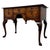 A particularly handsome and finely crafted 20th-century writing table, beautifully finished in richly figured burr walnut...