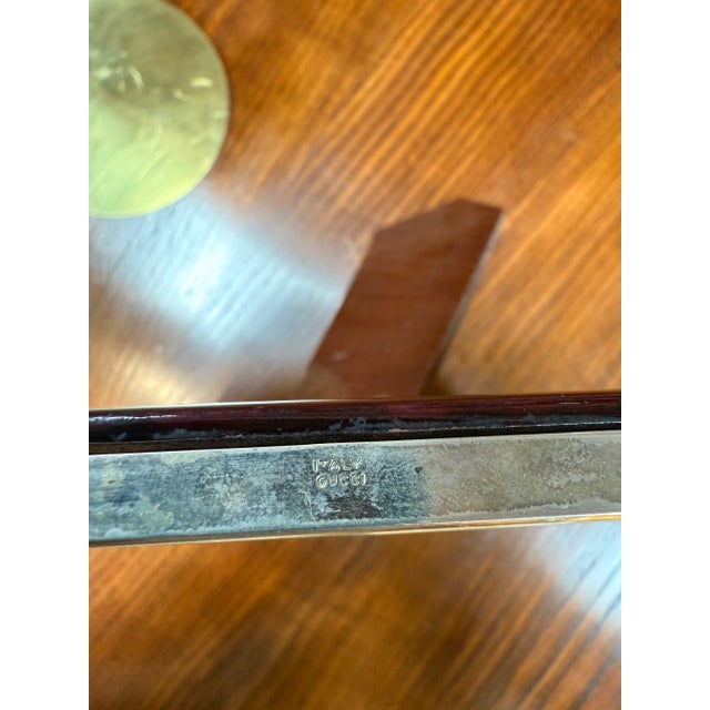 This authentic vintage Gucci photo frame, crafted in Italy, embodies timeless elegance with its refined equestrian bit...