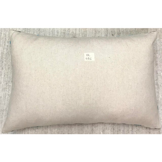 Silk Uzbek Ikat Velvet Hand Made Pillow Cushion with natural linen backing and hidden zipper. 10/90 down feather insert is...