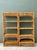Elevate your interior with this stunning pair of vintage woven rattan etageres, a captivating blend of organic warmth and...