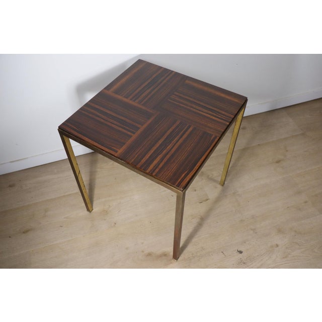 This side table with a refined and unique design seduces with the elegance of its materials and the purity of its lines....