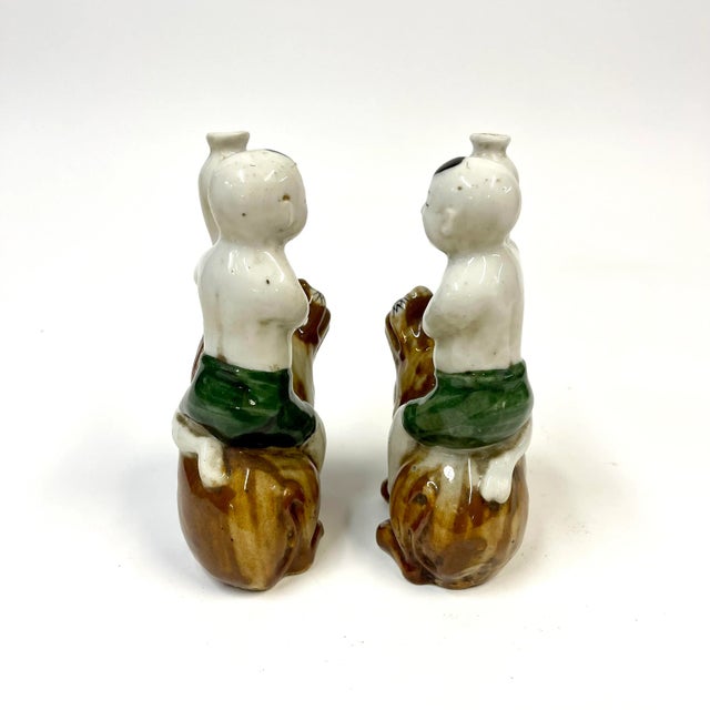 19th Century Porcelain Vases of Babies on Lions - a Pair For Sale - Image 4 of 11