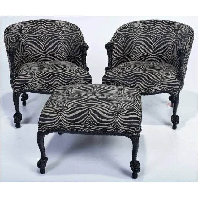 Spectacular set of Original Wieman Carved Wood Rope and Tassel Chairs with Matching Ottoman.A few spots on existing...