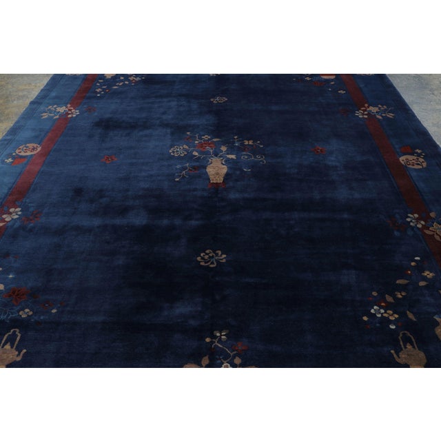 Hand-knotted in wool, this 9x12 circa 1900-1920, is a rare treasure from Rug & Kilim’s antique archives. Representing a...