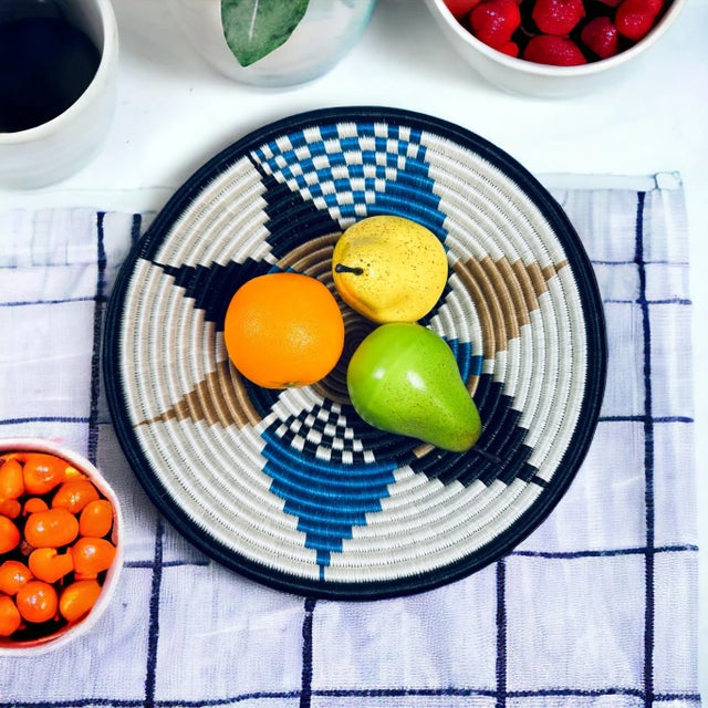 This perfect center piece Rwanda basket, African basket, Boho basket made of sweet grass and sisal. It can be used as...